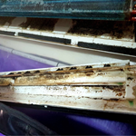 Damaged or Disconnected Drain Pan - Leaking Air Conditioner